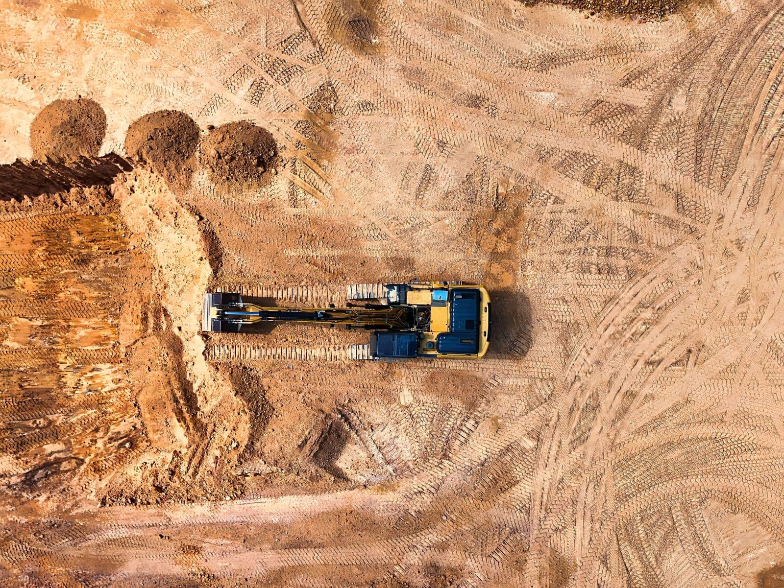 Earthmoving equipment developing an industrial site.