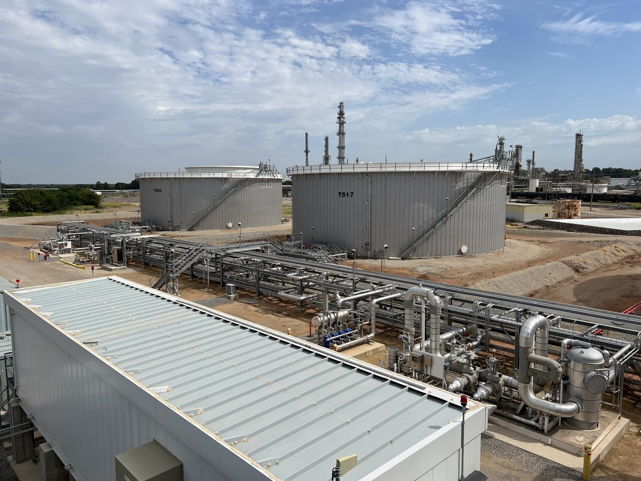 A permitted tank farm and process piping at an industrial facility.